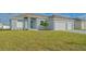 Newly built home with two-car garage and landscaped yard at 14304 Amestoy Ave, Port Charlotte, FL 33981