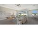 Spacious living room with sliding glass doors leading to backyard at 14304 Amestoy Ave, Port Charlotte, FL 33981