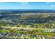 Aerial perspective of the property and surrounding neighborhood at 180 Rotonda N Blvd, Rotonda West, FL 33947