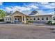 Community center with ample parking and welcoming facade at 1985 Coconut Palm Cir, North Port, FL 34288