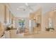 Well-equipped kitchen with breakfast nook and island at 268 Rotonda W Blvd # 1B, Rotonda West, FL 33947