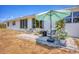 Relaxing patio with seating area and umbrella, great for outdoor living at 268 Rotonda W Blvd # 1B, Rotonda West, FL 33947