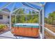 Relax in this screened-in hot tub, perfect for outdoor enjoyment at 268 Rotonda W Blvd # 1B, Rotonda West, FL 33947