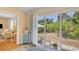 Sunroom with access to the backyard, creating a relaxing space at 268 Rotonda W Blvd # 1B, Rotonda West, FL 33947