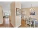 Bright dining area with view of the kitchen and living room at 268 Rotonda W Blvd # 1B, Rotonda West, FL 33947