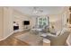 Bright living room with hardwood floors and comfy seating at 268 Rotonda W Blvd # 1B, Rotonda West, FL 33947