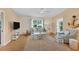 Bright and airy living room with hardwood floors at 268 Rotonda W Blvd # 1B, Rotonda West, FL 33947
