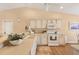 Modern kitchen with white cabinets and ample counter space at 268 Rotonda W Blvd # 1B, Rotonda West, FL 33947