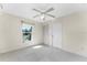 Bedroom with carpet, window, and closet at 289 White Marsh Ln, Rotonda West, FL 33947