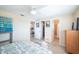 Bright bedroom with ample closet space and easy access to the bathroom and kitchen, featuring a ceiling fan at 42 Caroll Cir, Englewood, FL 34223