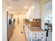 Modern kitchen boasts granite counters and stainless steel appliances at 42 Caroll Cir, Englewood, FL 34223