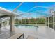 Inviting pool area with screened enclosure, spacious patio, and lounge chairs at 6 Tournament Rd, Rotonda West, FL 33947