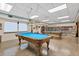 Community game room with billiard tables at 618 Deerwood Ave, Englewood, FL 34223