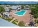 Aerial view of community pool, spa, and lounge area at 618 Deerwood Ave, Englewood, FL 34223