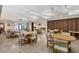 Community room with tables and chairs at 618 Deerwood Ave, Englewood, FL 34223