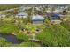 Aerial view showcasing the property's waterfront location and neighborhood at 8025 Weyers Ct, Englewood, FL 34224