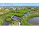 Elevated boardwalk path through mangroves at 8025 Weyers Ct, Englewood, FL 34224