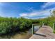 Private dock with direct access to the water at 8025 Weyers Ct, Englewood, FL 34224