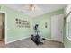 Dedicated home gym space with elliptical machine at 8025 Weyers Ct, Englewood, FL 34224