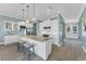 Bright and airy kitchen with a center island and stainless steel appliances at 8025 Weyers Ct, Englewood, FL 34224