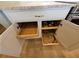 White kitchen cabinets with pull-out drawers for easy access at 8025 Weyers Ct, Englewood, FL 34224