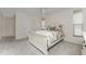 Charming bedroom with a queen bed and ample closet space at 10127 Peach Ave, Englewood, FL 34224