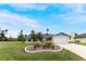 Single-story home with a two-car garage at 10127 Peach Ave, Englewood, FL 34224