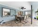 Covered patio with seating area and view of the pool at 10127 Peach Ave, Englewood, FL 34224
