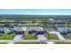 Aerial view of two houses near the water at 1097 Rotonda Cir, Rotonda West, FL 33947