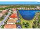 Aerial view of waterfront homes with private pools and lush landscaping at 12960 N Marsh Dr, Port Charlotte, FL 33953