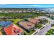 Community overview with lake and homes at 12960 N Marsh Dr, Port Charlotte, FL 33953