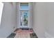 Front entry with brick walkway and etched glass door at 12960 N Marsh Dr, Port Charlotte, FL 33953