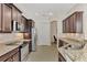 Modern kitchen with stainless steel appliances and granite countertops at 12960 N Marsh Dr, Port Charlotte, FL 33953