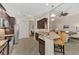 Kitchen features dark wood cabinets, granite countertops, and stainless steel appliances at 12960 N Marsh Dr, Port Charlotte, FL 33953