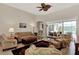 Living room with neutral color palette and view of pool at 12960 N Marsh Dr, Port Charlotte, FL 33953