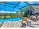 Inviting screened pool and patio area at 12960 N Marsh Dr, Port Charlotte, FL 33953