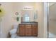Bathroom features granite countertop and shower at 13488 Abercrombie Dr, Englewood, FL 34223