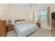 Spacious bedroom with a king-size bed and ample natural light at 13488 Abercrombie Dr, Englewood, FL 34223