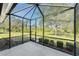 Spacious screened lanai offering a peaceful outdoor space at 13488 Abercrombie Dr, Englewood, FL 34223