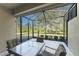 Spacious screened porch, perfect for outdoor dining at 13488 Abercrombie Dr, Englewood, FL 34223