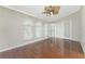 Living room with hardwood floors, high ceilings and French doors at 13694 Begonia Cir, Port Charlotte, FL 33981