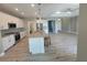 Well-equipped kitchen featuring stainless steel appliances, granite countertops, and an island with seating at 14331 Montmarte Ave, Port Charlotte, FL 33981