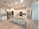 Modern kitchen with granite countertops and white cabinets at 14331 Montmarte Ave, Port Charlotte, FL 33981