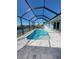 Enjoy the outdoors with a relaxing pool and lake view at 14331 Montmarte Ave, Port Charlotte, FL 33981