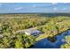Single-Gathering home on waterfront lot at 14351 Howard Ave, Port Charlotte, FL 33953