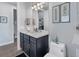 Small bathroom with toilet and vanity at 14351 Howard Ave, Port Charlotte, FL 33953