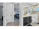 Modern bathroom with a walk-in shower and vanity at 14351 Howard Ave, Port Charlotte, FL 33953