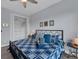 Bright bedroom with a large closet and comfortable bedding at 14351 Howard Ave, Port Charlotte, FL 33953