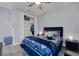 Bedroom with queen bed, walk-in closet, and wood floors at 14351 Howard Ave, Port Charlotte, FL 33953
