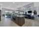 Island kitchen with granite countertops and stainless steel appliances at 14351 Howard Ave, Port Charlotte, FL 33953